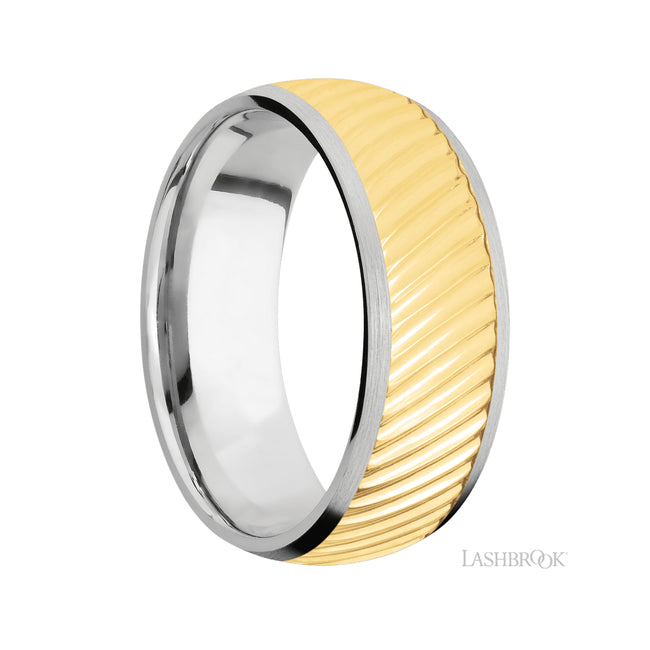 8 mm wide/Domed/14K White Gold band with one 6 mm Centered inlay of 14K Yellow Gold with a machined Ripple pattern.