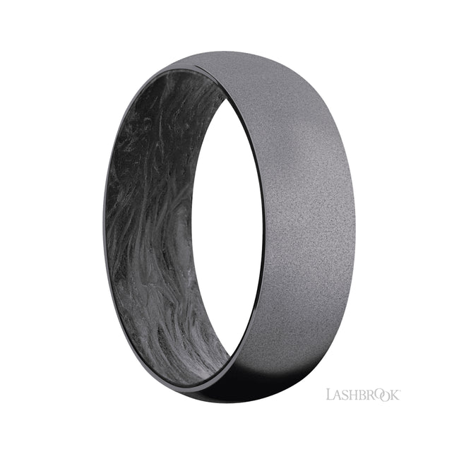 7 mm wide Domed Tantalum band featuring a Forged Carbon Fiber sleeve.