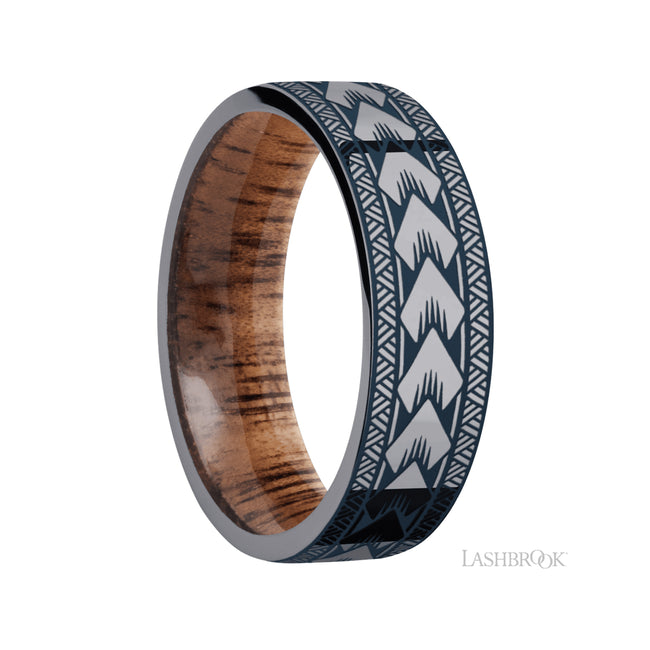 7 mm wide/Flat/Tantalum band with a laser carved Maori pattern also featuring a Koa sleeve.