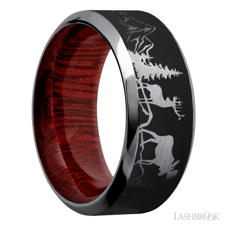 9 mm wide/High Bevel/Tantalum band with a laser carved Bear Moose Deer Mountain pattern also featuring a Blood Wood sleeve.